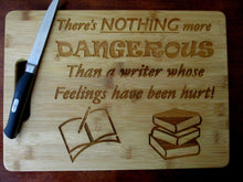 Load image into Gallery viewer, Custom Cutting Board "There's nothing more dangerous than a writer whose feelings have been hurt." Laser-engraved bamboo board Writers Gift